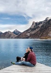 couple hugging at a lake