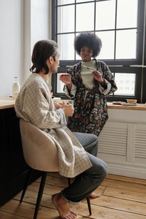 couple talking about their relationship in a kitchen