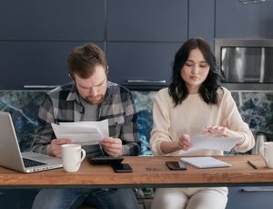 couple working on solving their debt