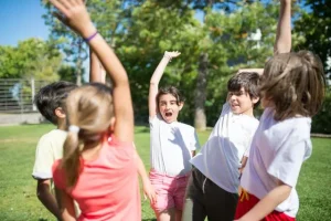 kids with hands in the air